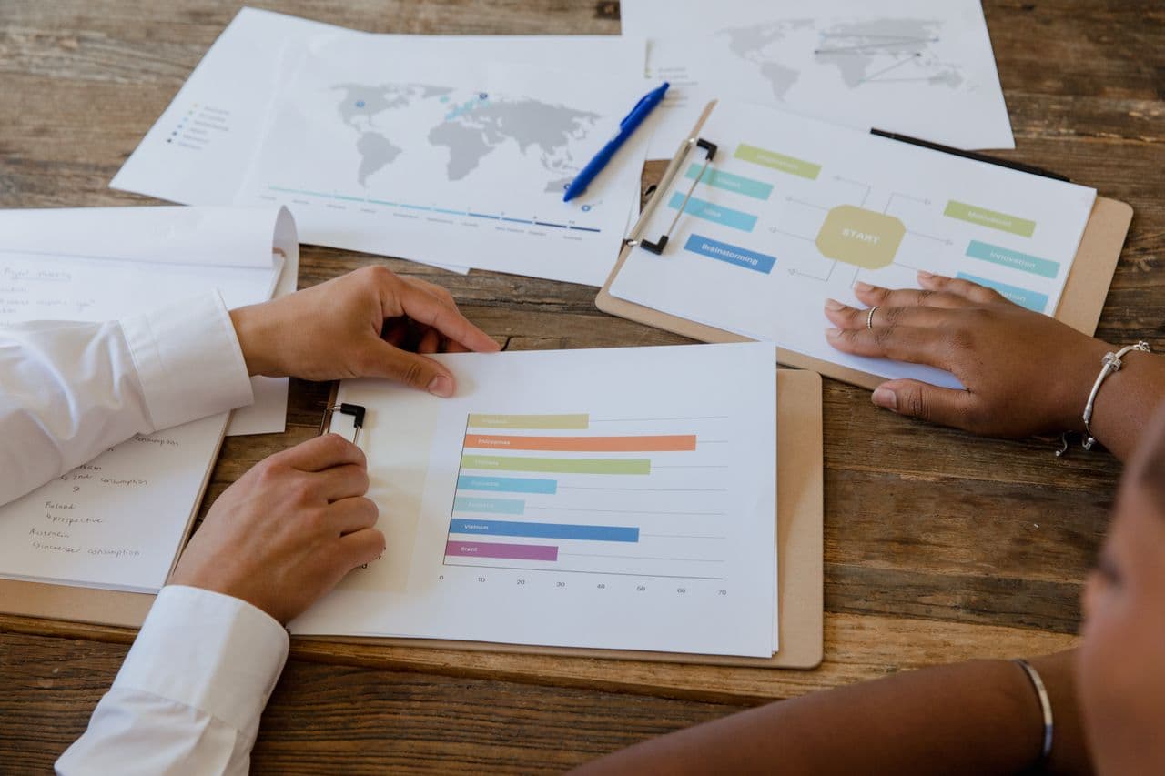 Reviewing documents at a boardroom table