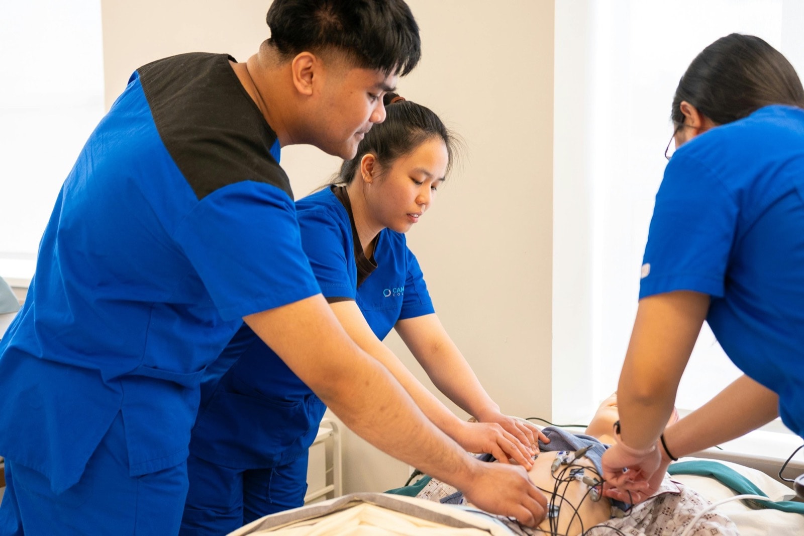 Filipino nurses completing clinical training in the Philippines before deployment to the UAE, Saudi Arabia, and Qatar